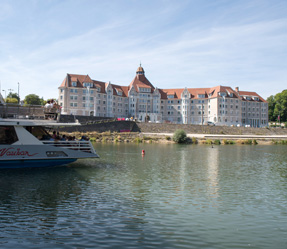 15 a small boat in a body of water