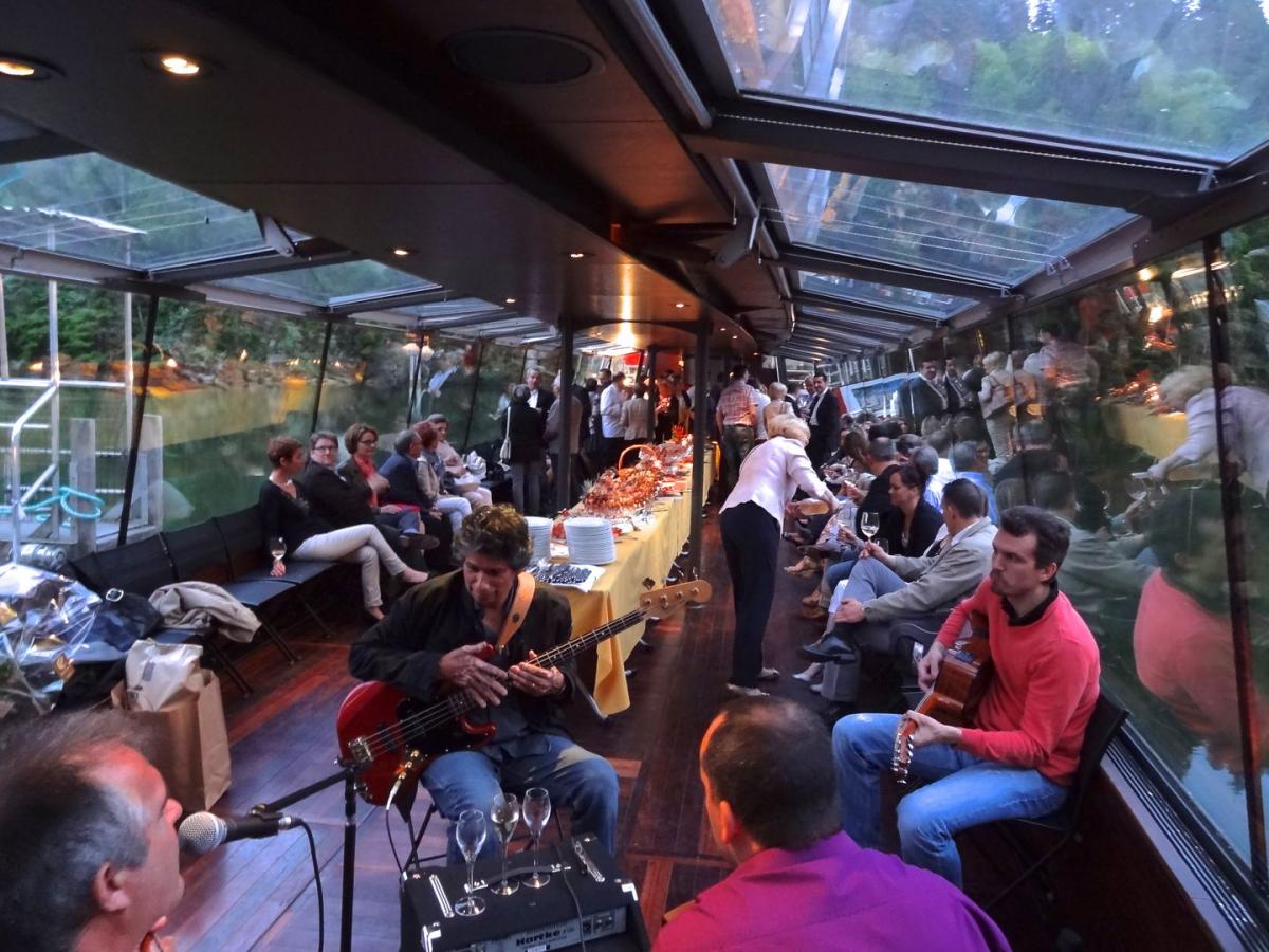 a group of people sitting in front of a crowd