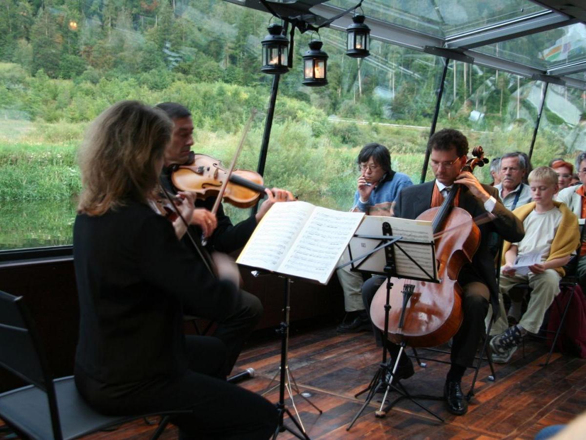 a group of people sitting at a table
