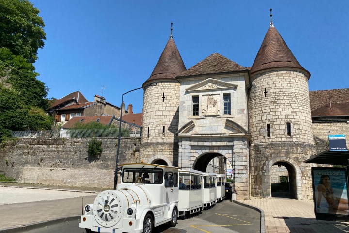 a truck is parked in front of a building