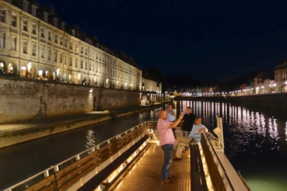 a woman walking on a bridge
