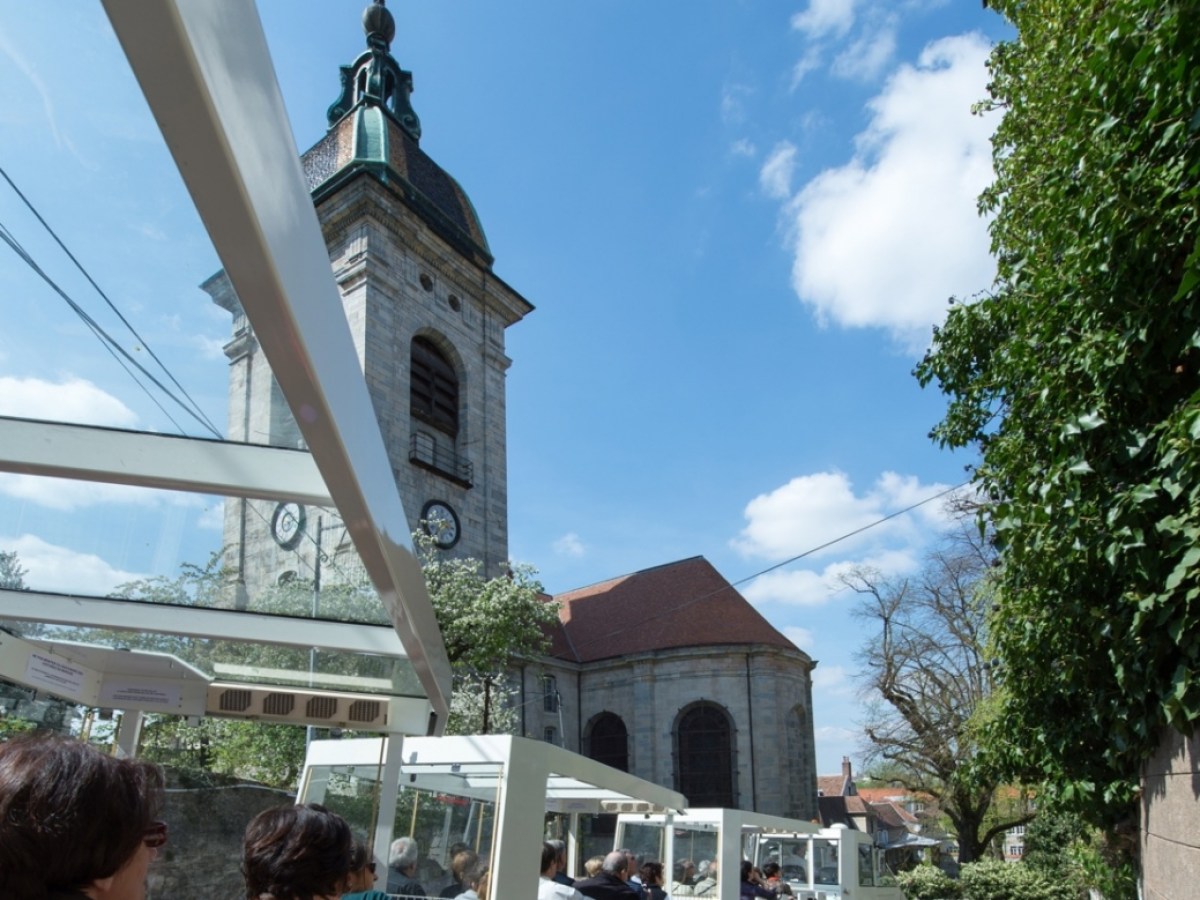 a group of people standing in front of a building