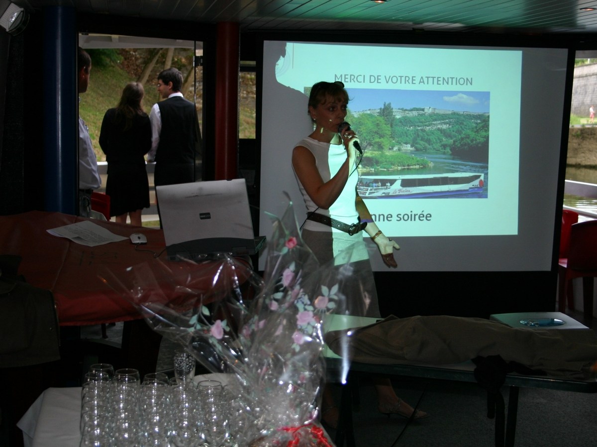 a group of people sitting at a table