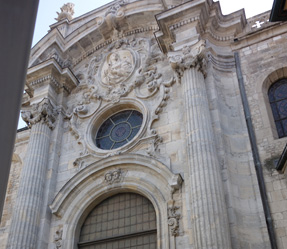 m a large stone building with a clock